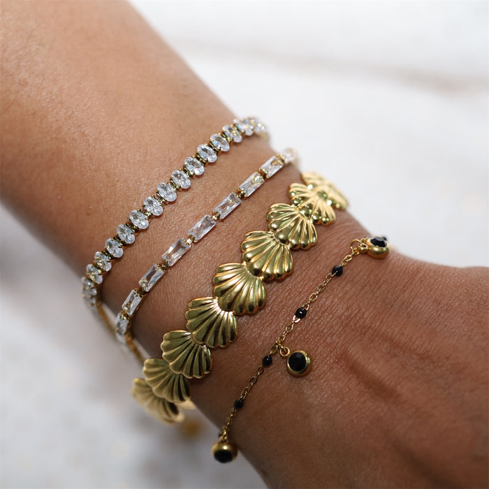 Bracelet tennis doré – Pierres ovales transparentes et cristallines en zirconium ✨