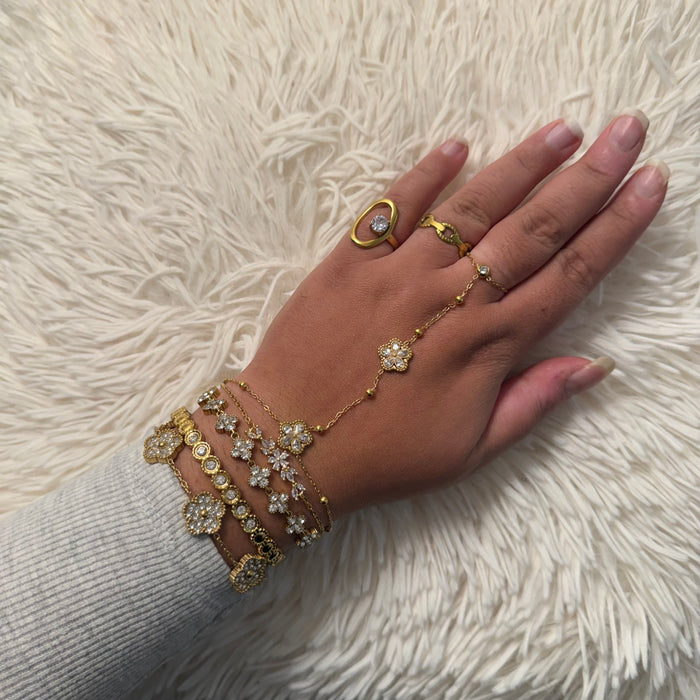 Chaîne de main dorée en acier inoxydable et pierres en zirconium ✨