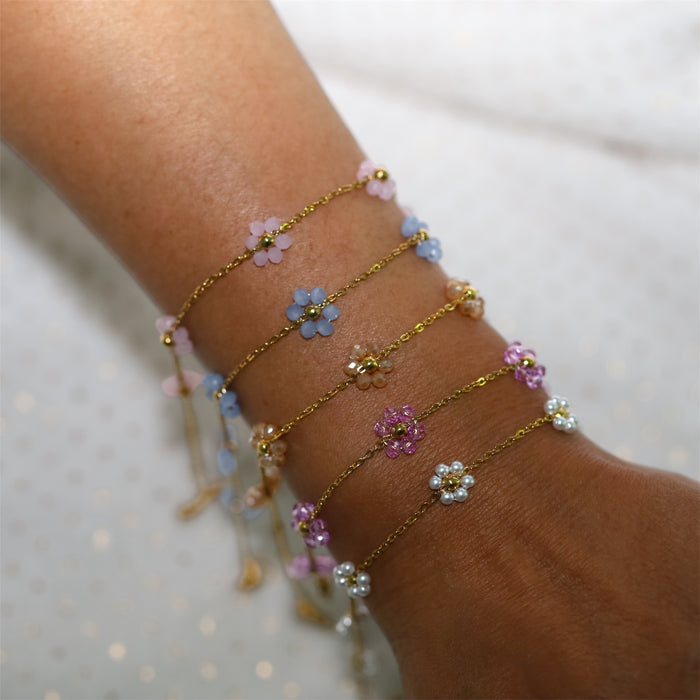 Bracelet doré avec fleurs en perle violette – Élégance printanière ✨