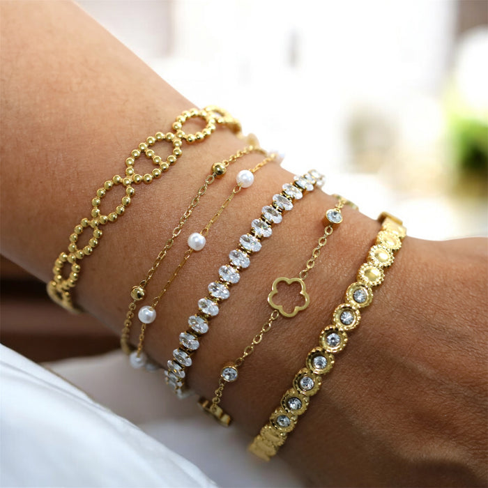 Bracelet doré – Fleurs ajourées & zirconium scintillant ✨