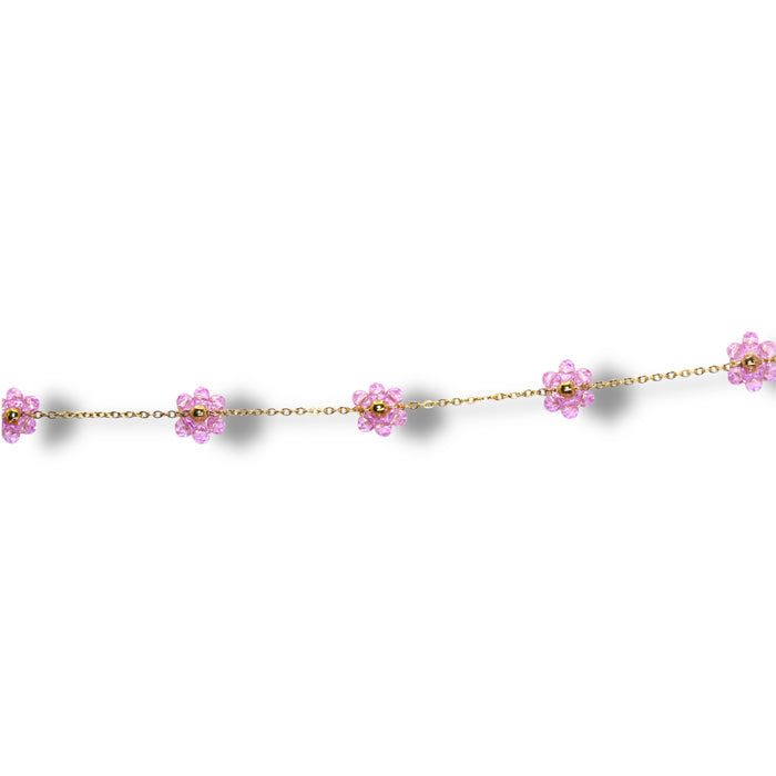 Bracelet doré avec fleurs en perle violette – Élégance printanière ✨