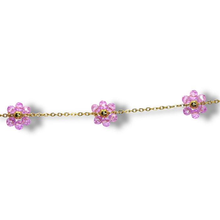 Bracelet doré avec fleurs en perle violette – Élégance printanière ✨